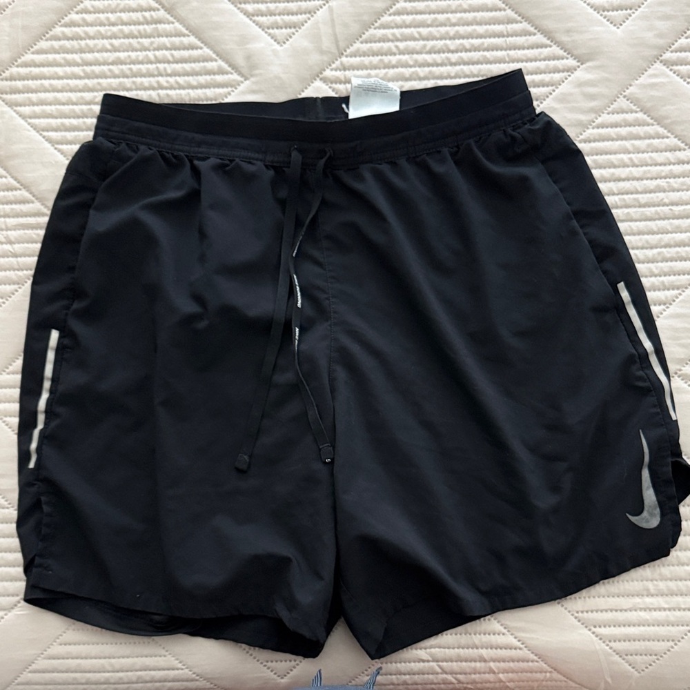 Nike Men's Black Athletic Shorts with Silver Accents
